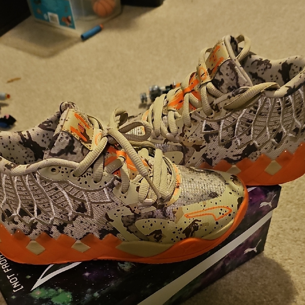 Puma Melo Kids Camouflage Sneakers with Orange Accents